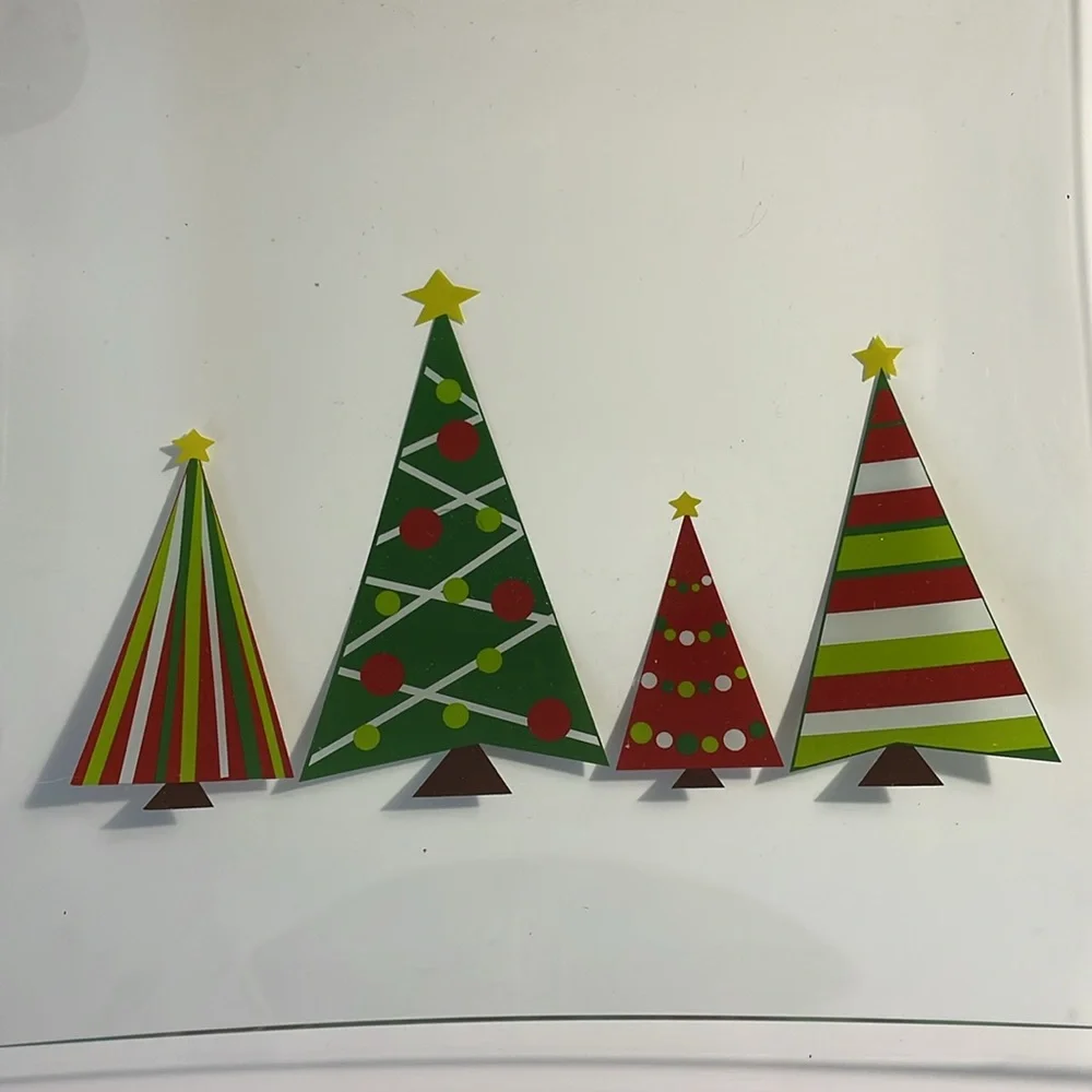 The Pampered Chef Holiday Serving Plate and‎ Set of 2 Holiday Spreaders.